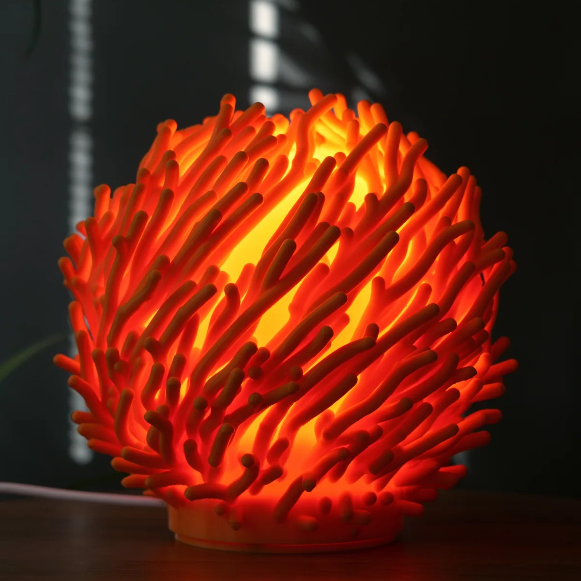 Side profile of the O7 Coral Sculpted Lamp highlighting flowing coral-like curves and elegant texture.