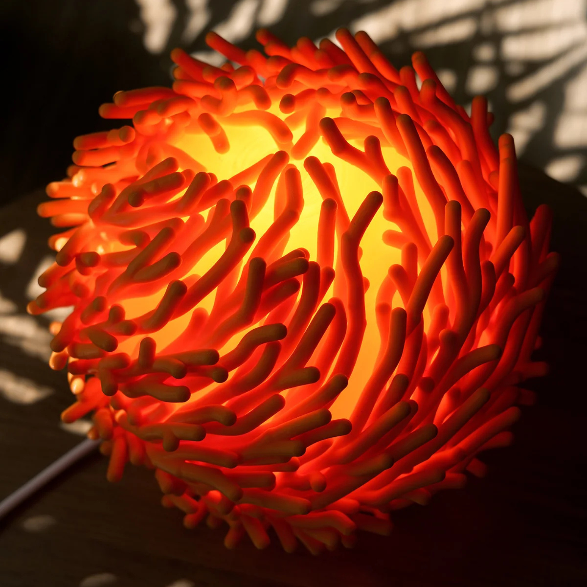 O7 Coral Sculpted Lamp emitting a warm ambient light that enhances modern interior spaces.